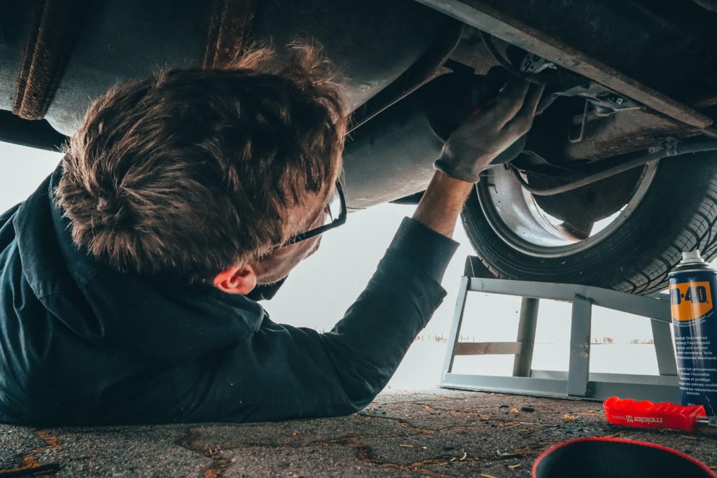 mechanic fixing a car